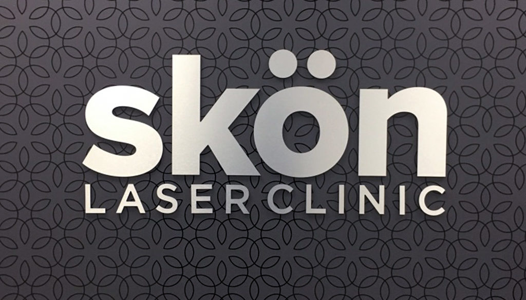 interior brand signage, interior wall signage, Skon Laser Clinic Brand Design by BANG! creative strategy by design